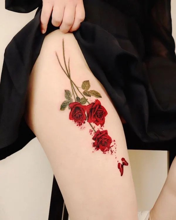 floral thigh tattoos